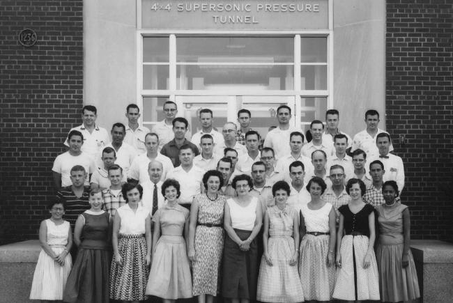 Photo of the staff of the supersonic pressure tunnel at Langley Laboratory in 1956. The "human computer" women are on the front row. Mary Jackson is on the far right.